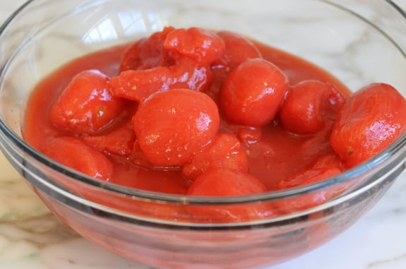 Bowl of whole tomatoes.