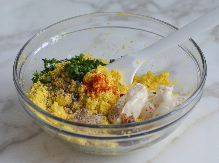Mashed egg yolks combined with other filling ingredients.