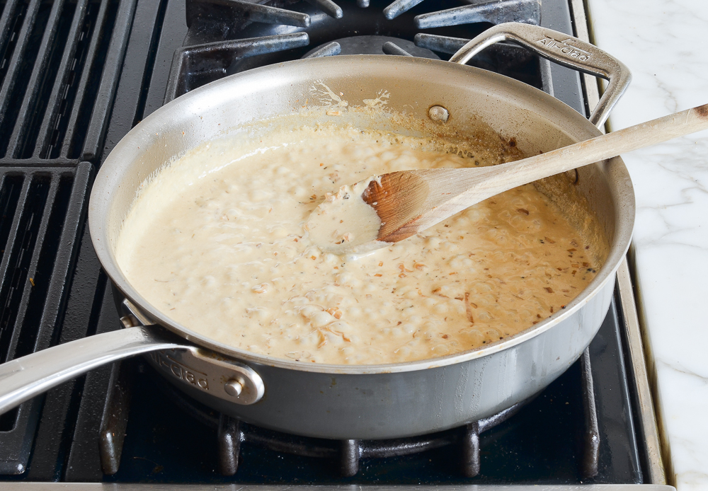 Skillet of thickened sauce.