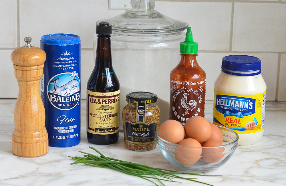 Sriracha deviled eggs ingredients including Worcestershire sauce, mayonnaise, and sea salt.