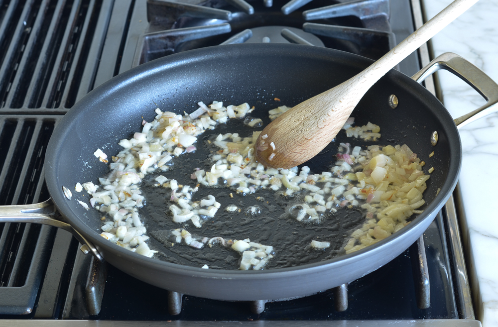Shallots and butter in a skillet.