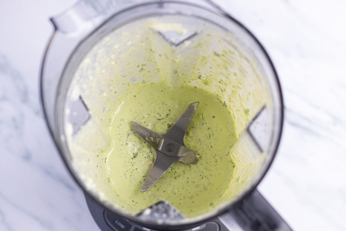 blended green sauce in blender