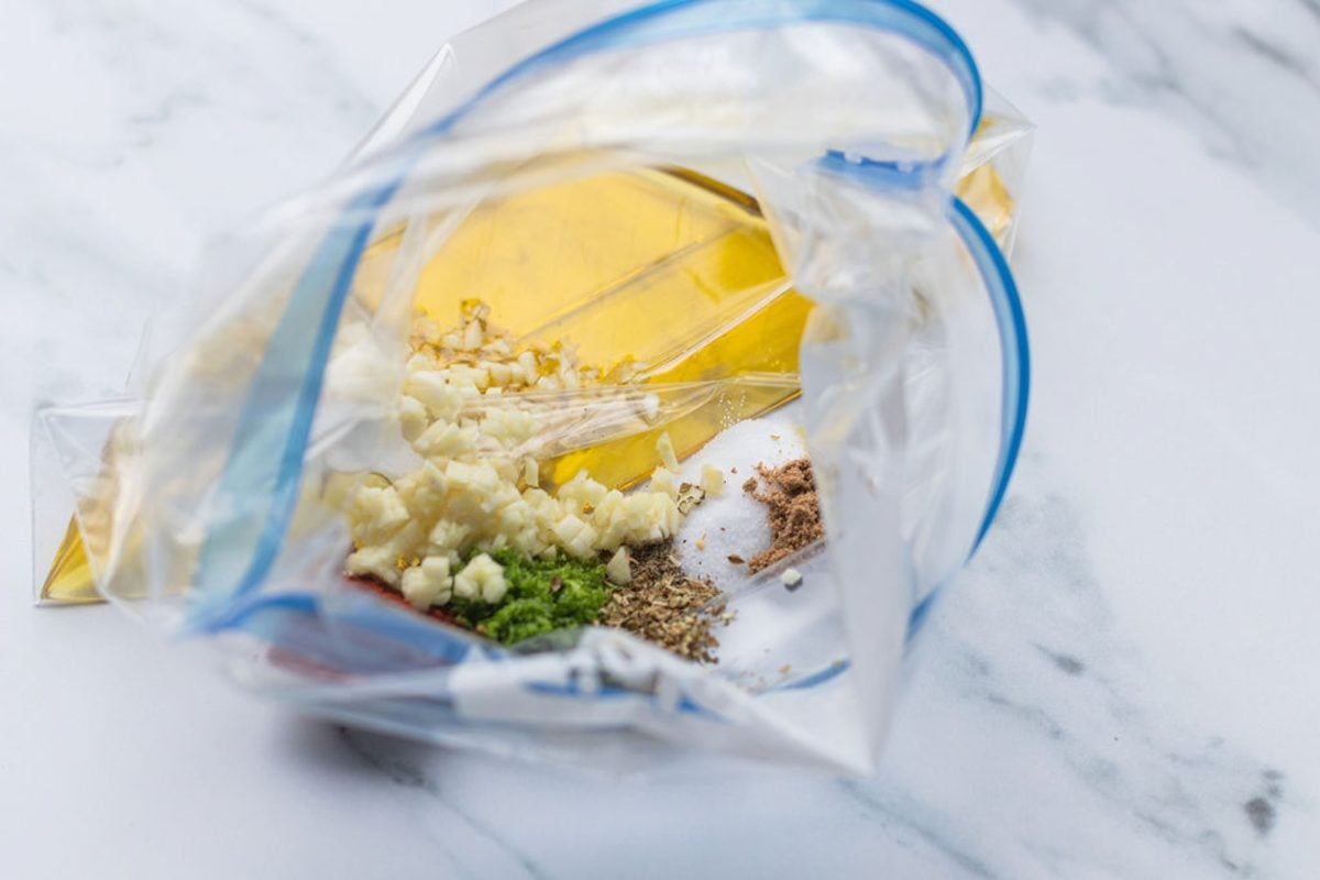 marinade ingredients combined in zip-lock bag