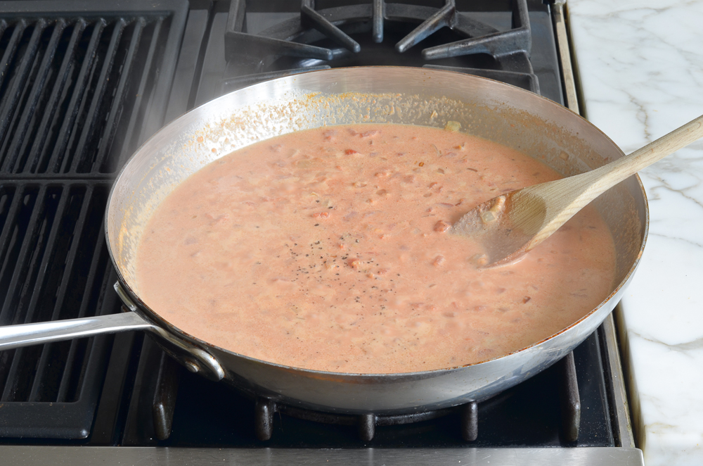 simmering chicken tikka masala sauce