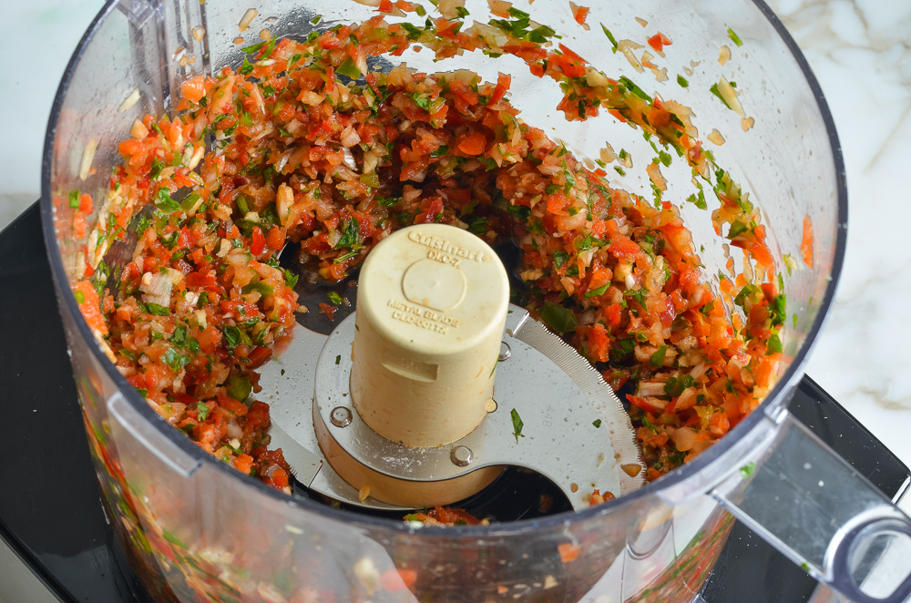 Processed vegetables in a food processor.