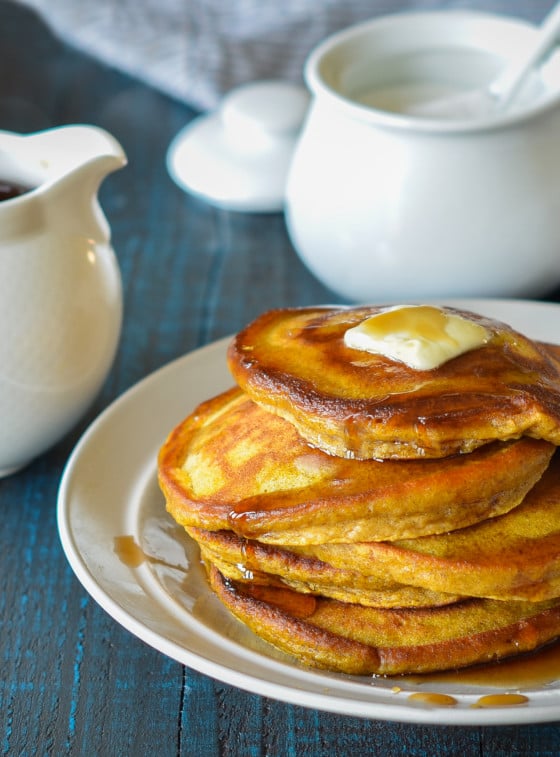 Stack of pumpkin pancakes on a plate.