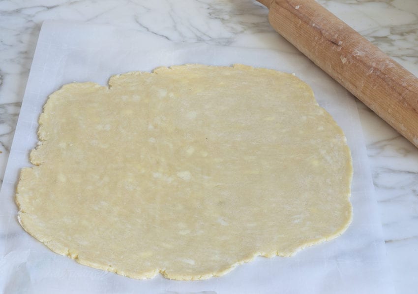 Rolling pin with dough.