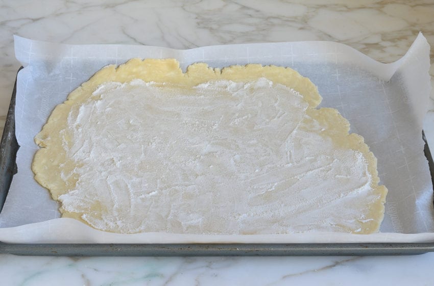 Dough topped with flour.