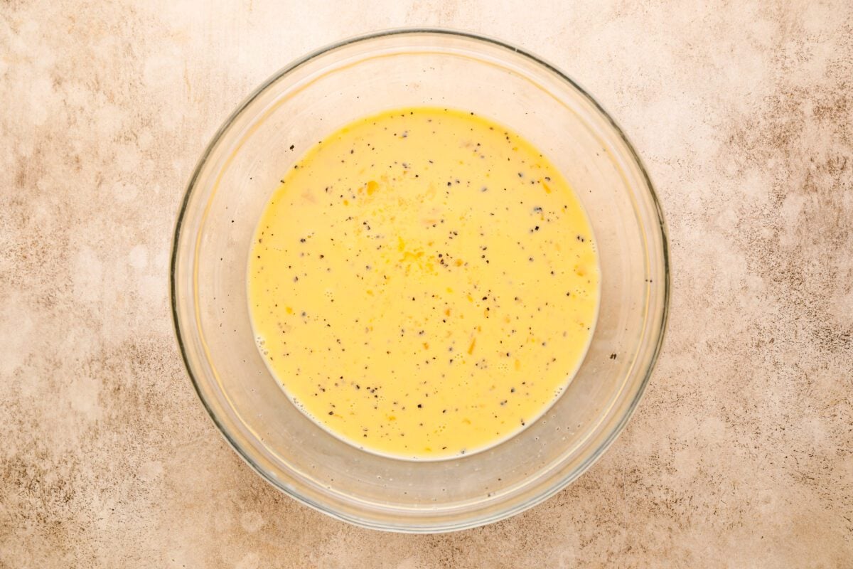 medium bowl with milk, eggs, pepper, and ¾ teaspoon salt