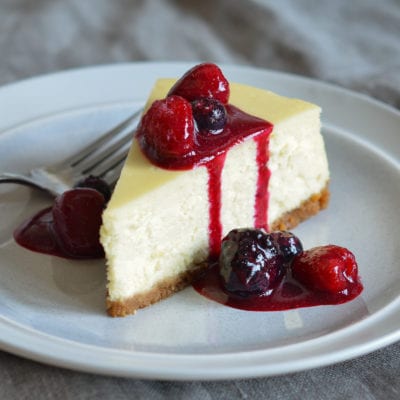 Slice of Cheesecake on a plate.