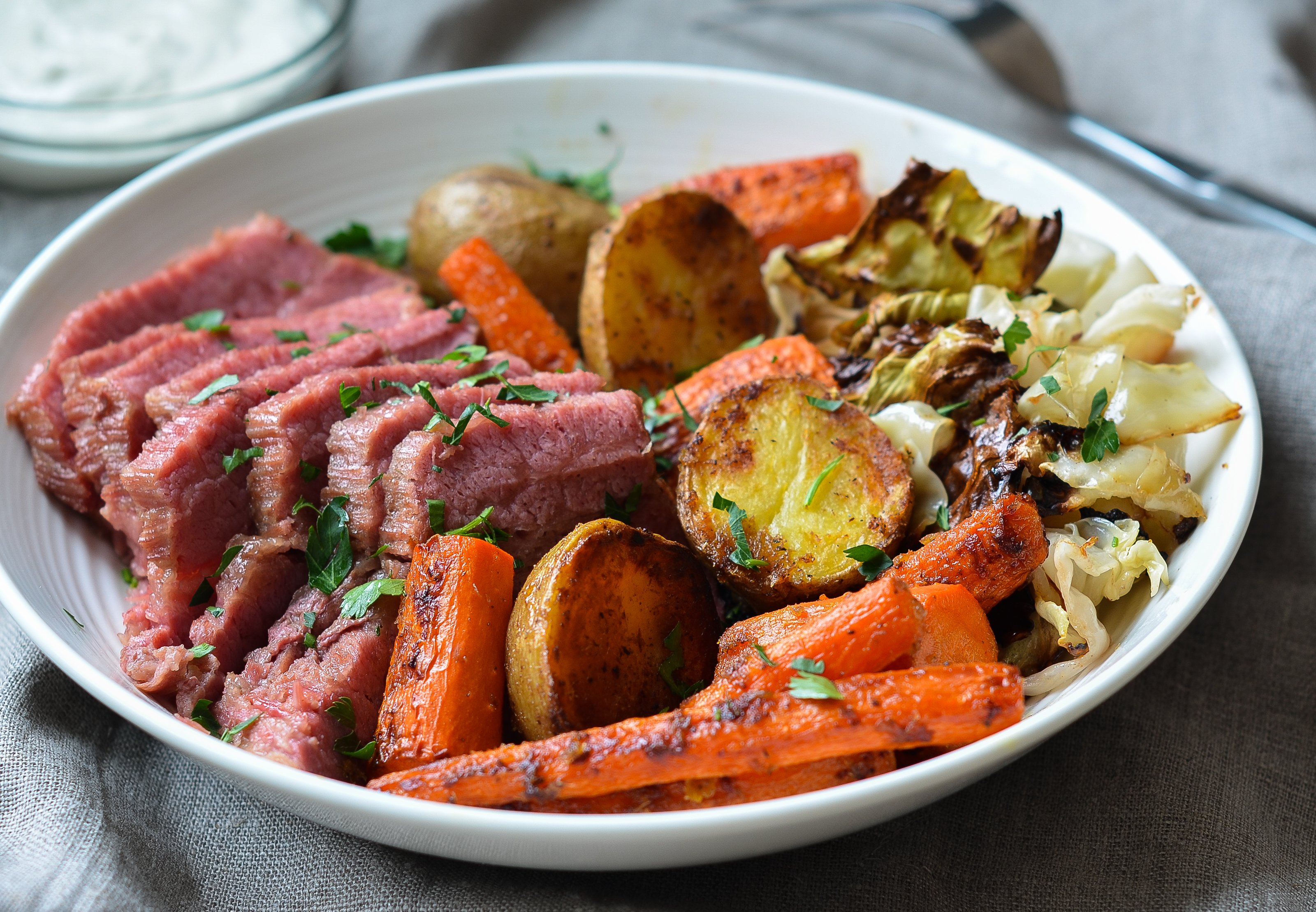 Roasted Corned Beef and Cabbage with Carrots, Potatoes & Horseradish Cream  Sauce