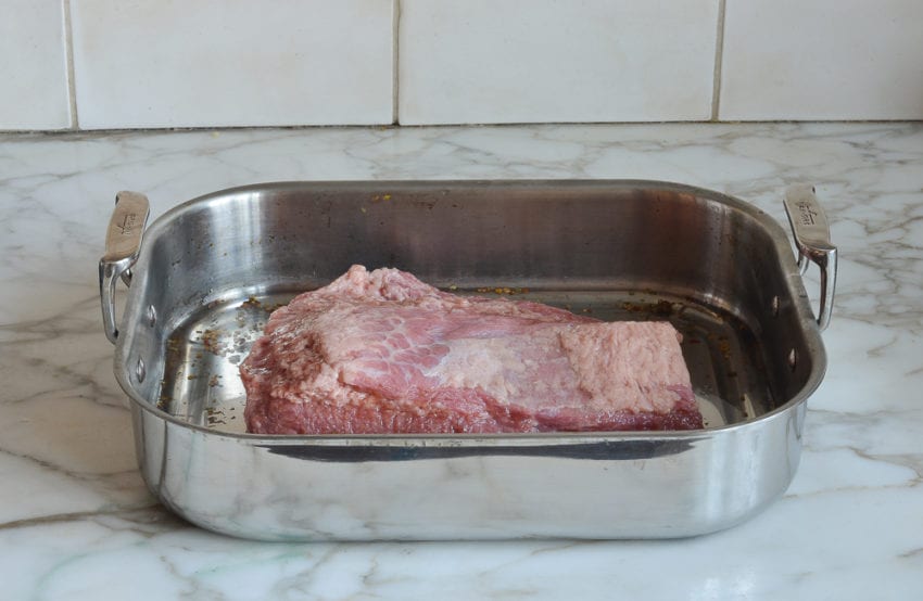 making corned beef and cabbage - corn beef in roasting pan with a little water