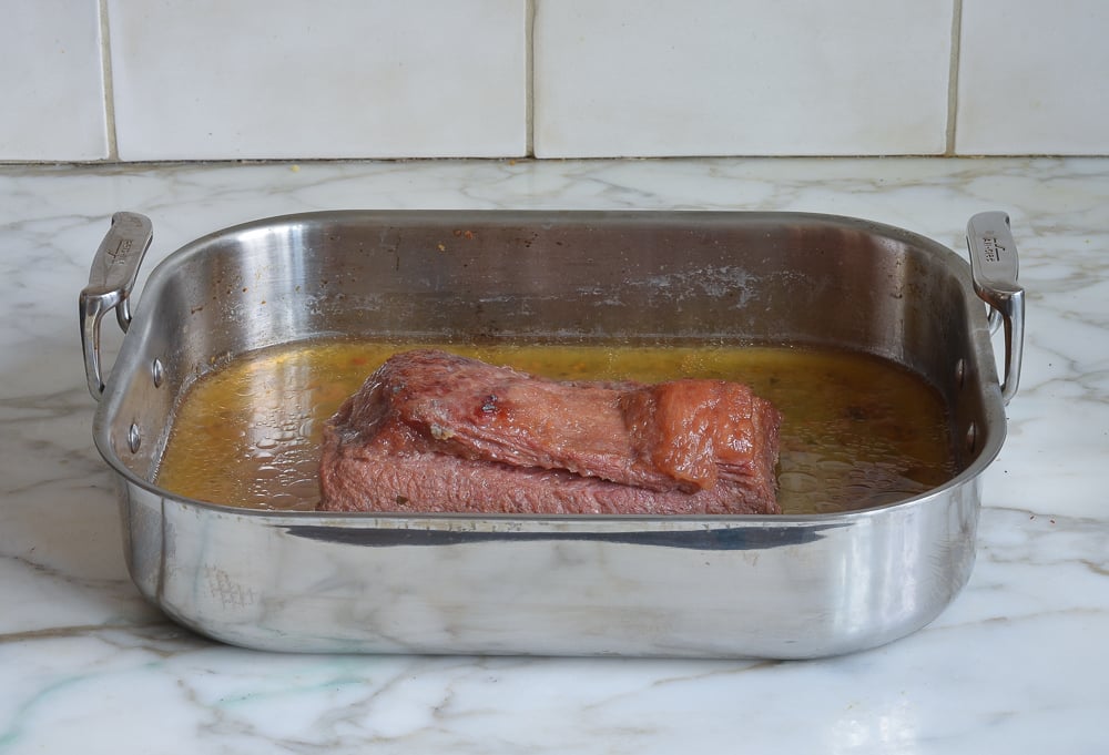 making corned beef and cabbage - roasted corned beef fresh out of the oven