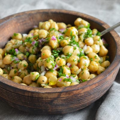 Wooden bowl of Chickpea Salad.