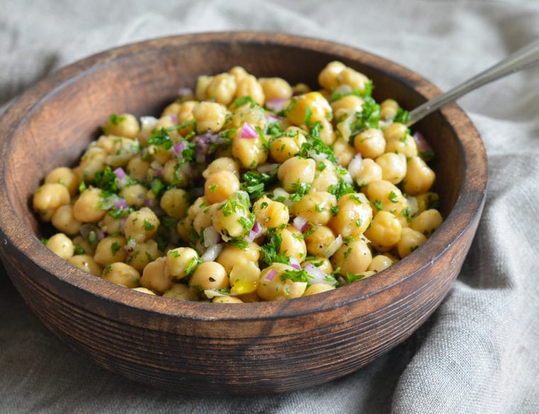 Wooden bowl of Chickpea Salad.