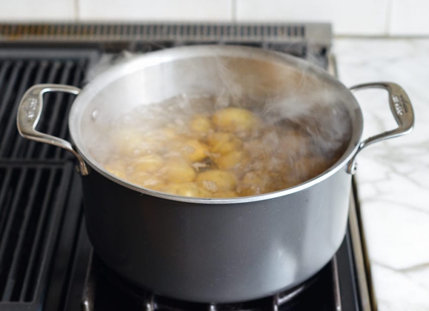 simmering baby potatoes