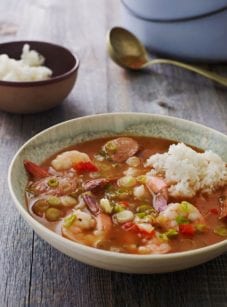 gumbo in bowl with small scoop of rice on top