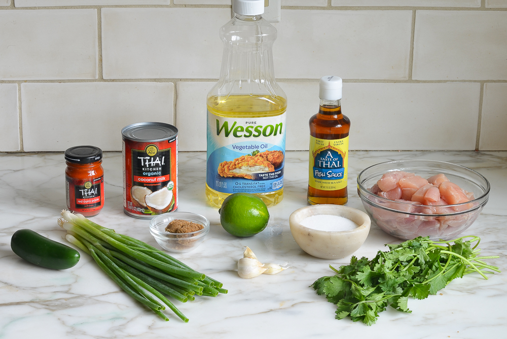 Curry ingredients including coconut milk, fish sauce, and lime.