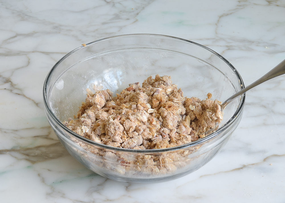 Bowl of crumbly nut and butter mixture.