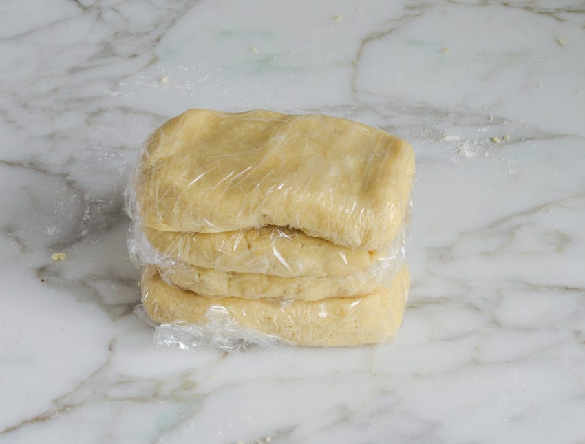 Pile of plastic-wrapped dough.