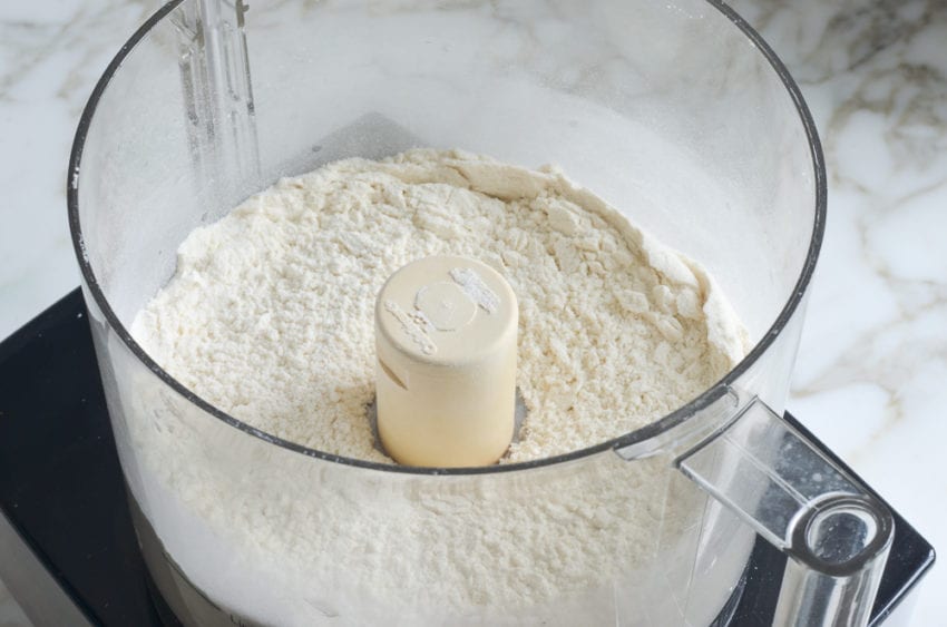 Mixed dry ingredients in a food processor.