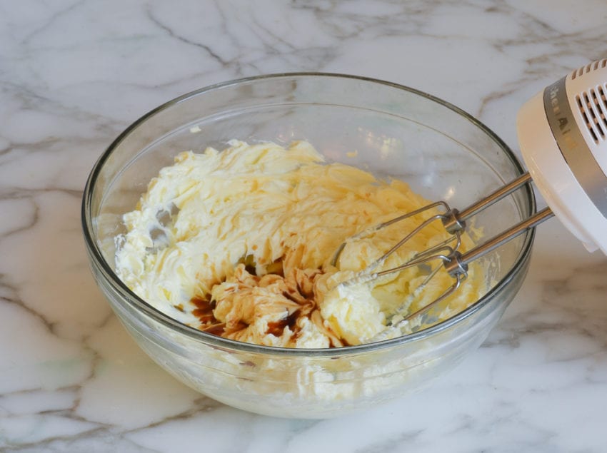 Vanilla in a bowl with a cream cheese mixture.