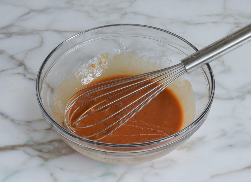 Whisk in a bowl of sweet and sour sauce.