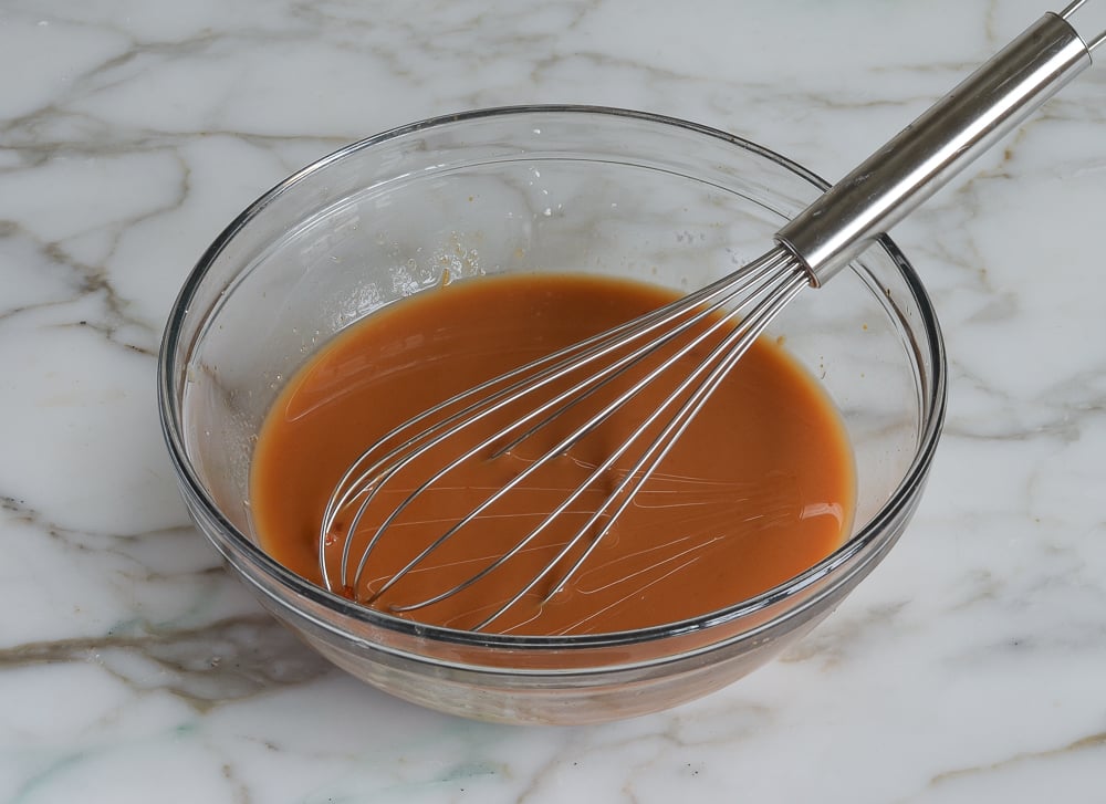 Whisk in a bowl of sweet and sour sauce.
