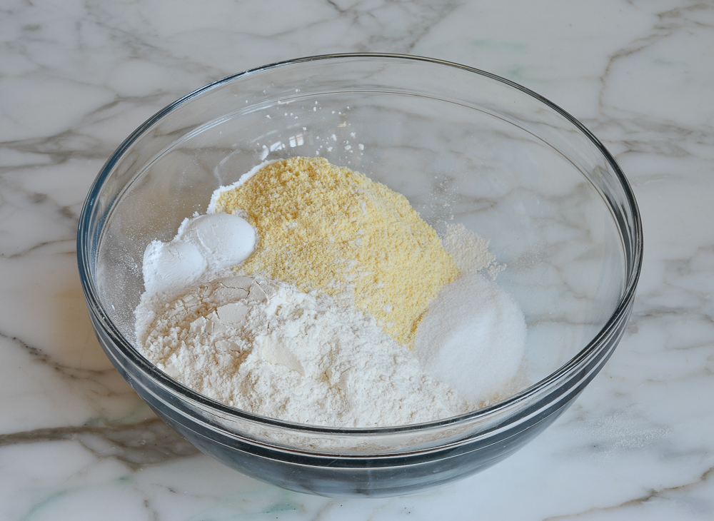 combining the dry ingredients in a mixing bowl
