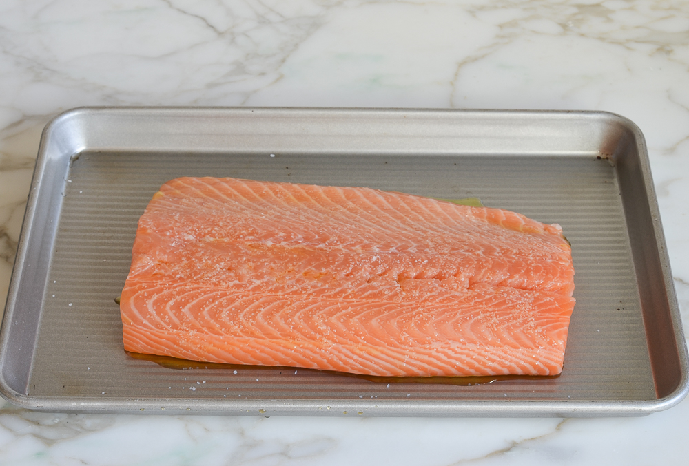 Salmon on a baking sheet.