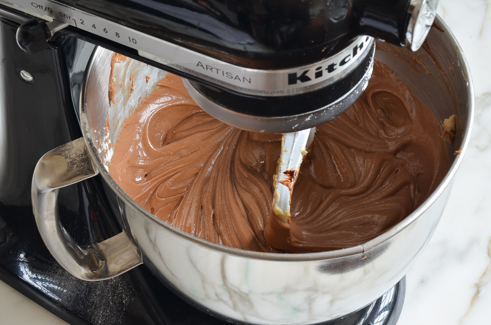 Chocolate batter in a stand mixer.