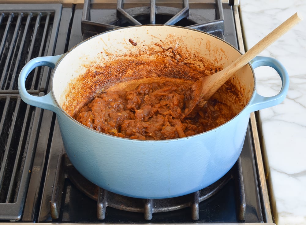 stirring flour and onions