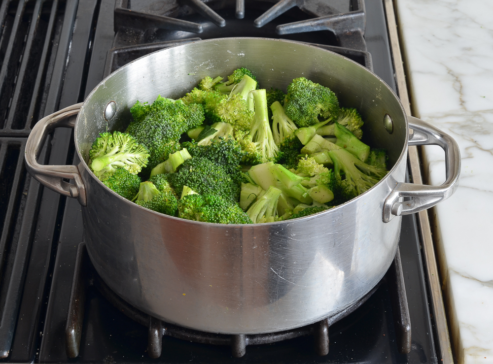 Pan full of broccoli florets.