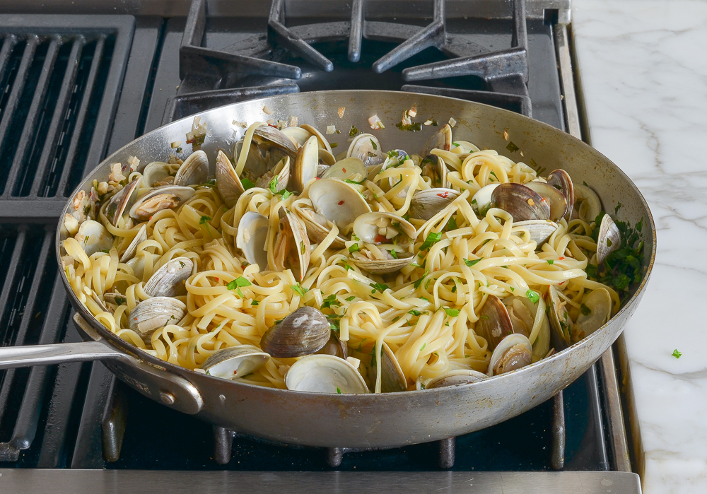finished linguini with clams in pan