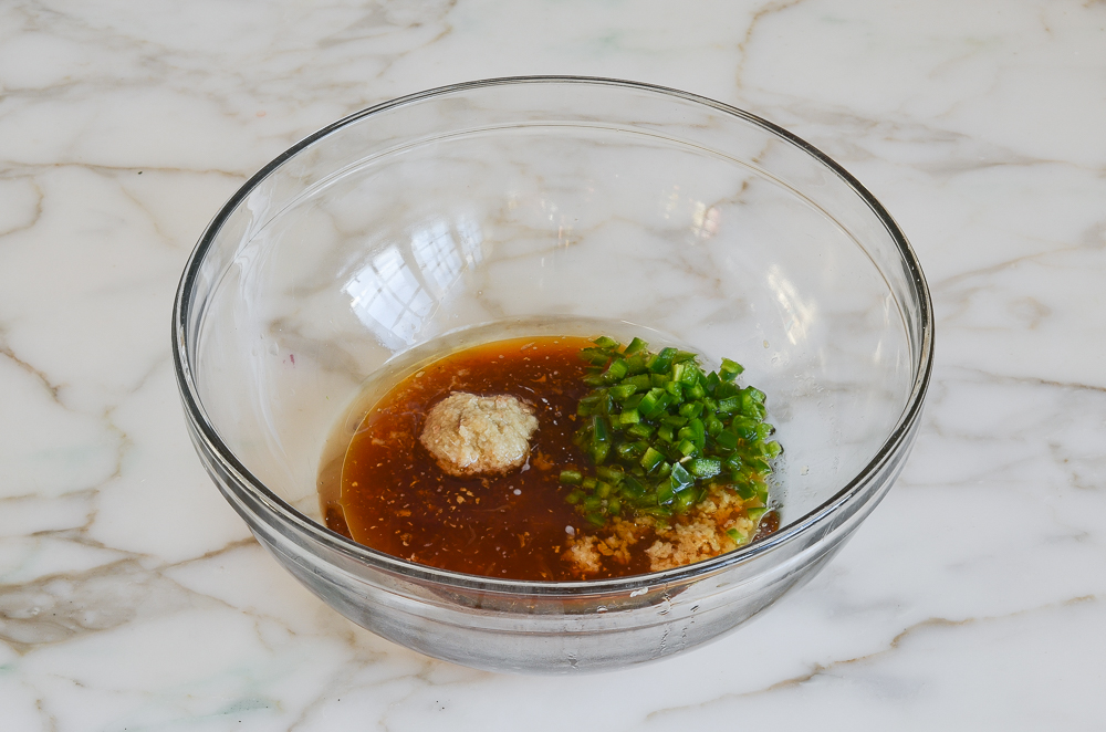 ginger-sesame dressing ingredients in bowl