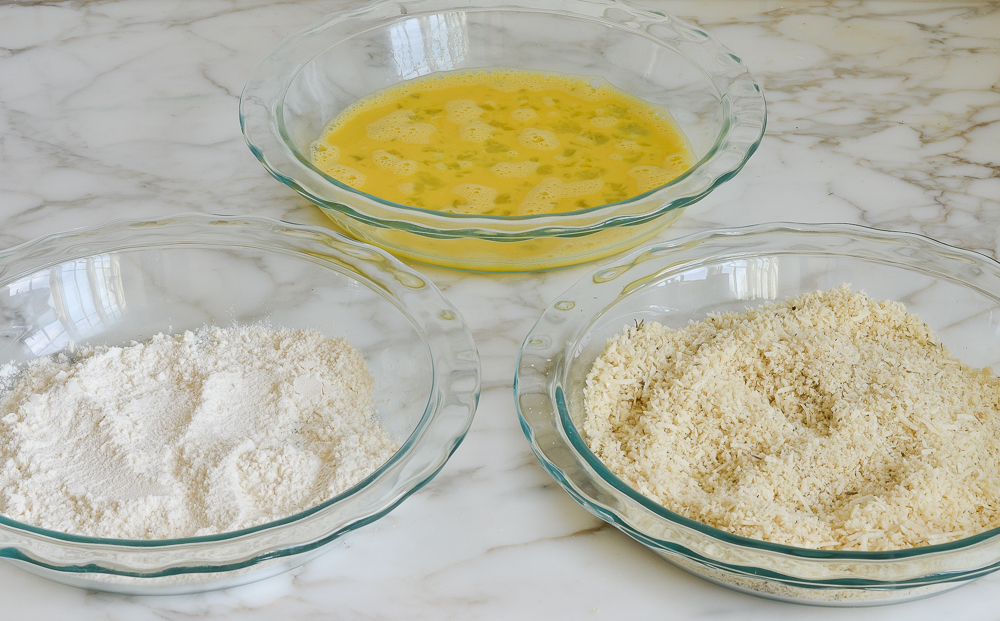 breading station with flour, eggs, and panko mixture