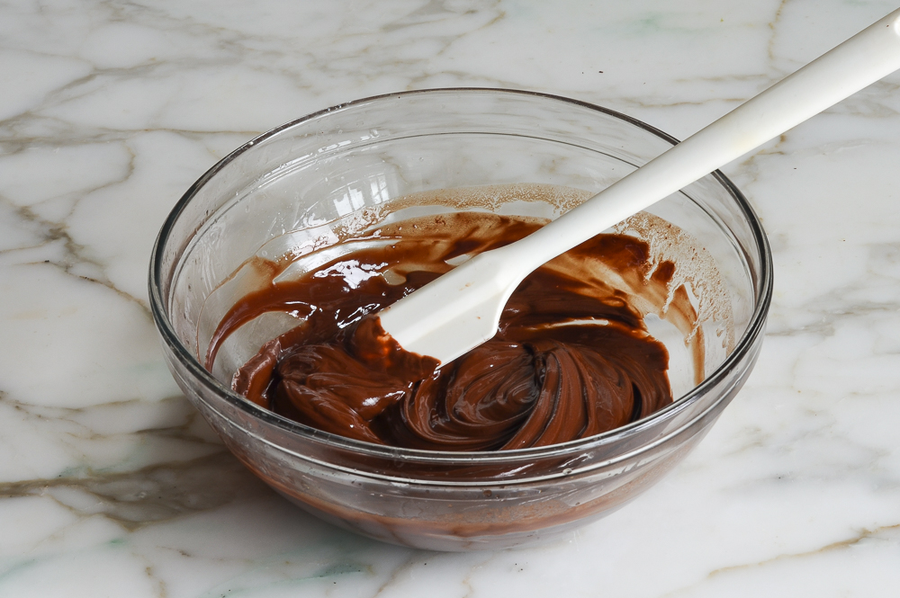 egg yolks whisked into melted chocolate mixture