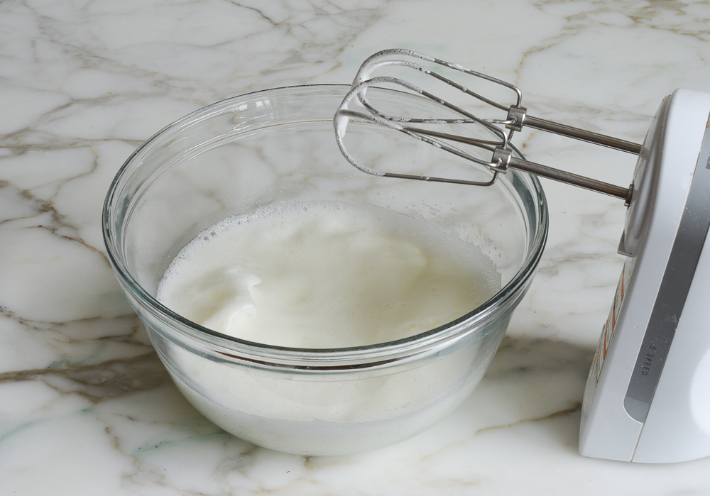 beating the egg whites to soft peaks