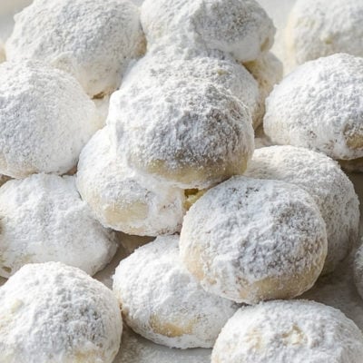 Pile of coconut-lime Mexican wedding cookies.