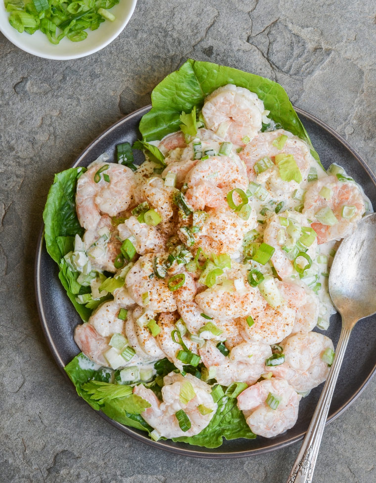 Spoon on a plate with Old Bay shrimp salad.