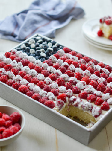 Cake decorated like an American flag missing a piece.