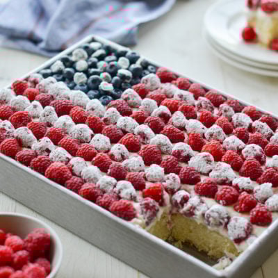 Cake decorated like an American flag missing a piece.