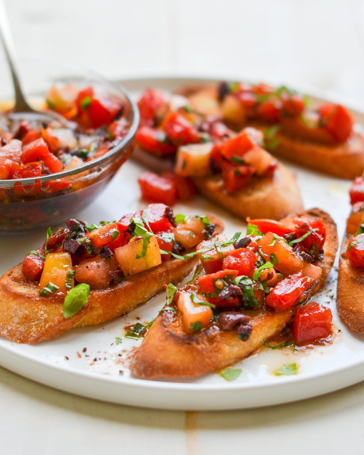 Bruschetta with Heirloom Tomatoes, Olives, and Basil
