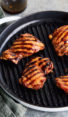 Char siu chicken on a grill pan.