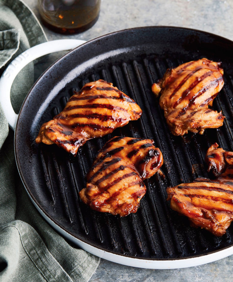 Char siu chicken in a grill pan.