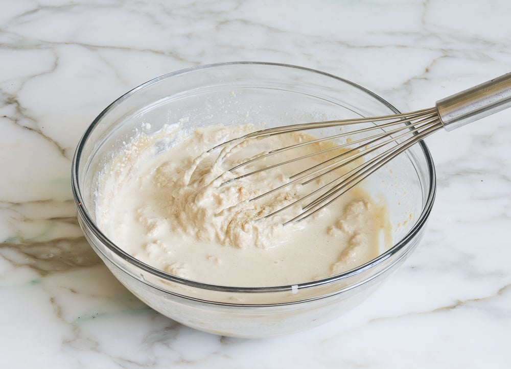 whisking tahini sauce