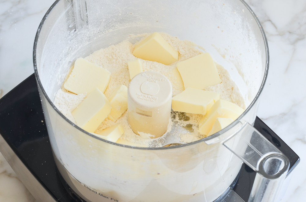 adding butter to flour mixture