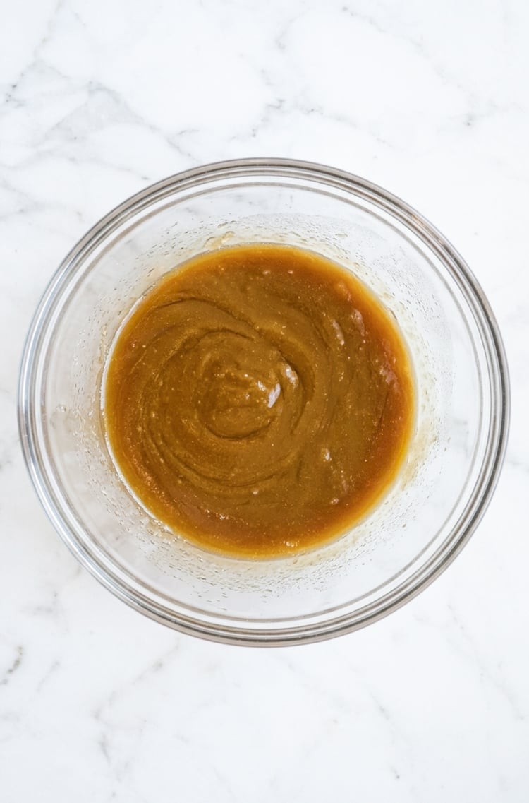 melted butter and brown sugar mixed in bowl
