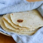 stack of homemade corn tortillas.