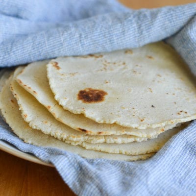 stack of homemade corn tortillas.